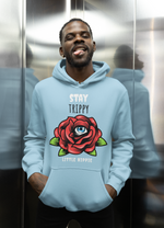 Load image into Gallery viewer, Man wearing a Stay Trippy   – Baby Blue Unisex Printed Hoodie