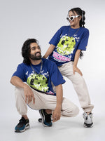 Load image into Gallery viewer, Kindness Growing Royal Blue Unisex Oversized T Shirt Front Design view of Female and Male