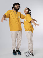 Load image into Gallery viewer, Take It Easy Mustard Unisex Oversized T-Shirt Front Design View of Male and Female