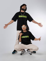 Load image into Gallery viewer, Marijuana Black Unisex Oversized T Shirt front design view of male and female