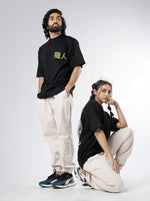 Load image into Gallery viewer, Master Hunter Black  Unisex Oversized T-Shirt Front  View of Male and Female