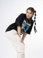 Load image into Gallery viewer, Feel the Pain Black Unisex Oversized T-Shirt Front View Of Female