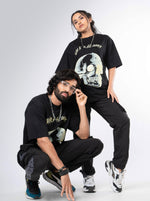 Load image into Gallery viewer, Dark and Gloomy Black Unisex Oversized T-Shirt Front View Of Male and Female