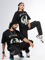 Load image into Gallery viewer, Dark and Gloomy Black Unisex Oversized T-Shirt Front View Of Male and Female