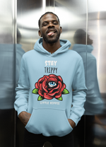 Load image into Gallery viewer, Man wearing a Stay Trippy   – Baby Blue Unisex Printed Hoodie
