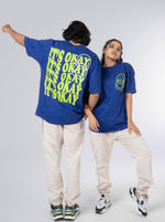 Load image into Gallery viewer, Its Okay Royal Blue Oversized T-shirt front and Back Design view of Male and Female
