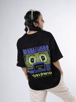 Load image into Gallery viewer, Marijuana Black Unisex Oversized T Shirt back design view of female
