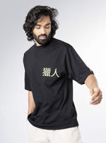 Load image into Gallery viewer, Master Hunter Black  Unisex Oversized T-Shirt Front  View of Male
