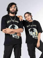 Load image into Gallery viewer, Dark and Gloomy Black Unisex Oversized T-Shirt Front View Of Male and Female
