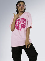 Load image into Gallery viewer, Stay Weird Soft Pink Unisex Oversized T-Shirt Front View Of Female
